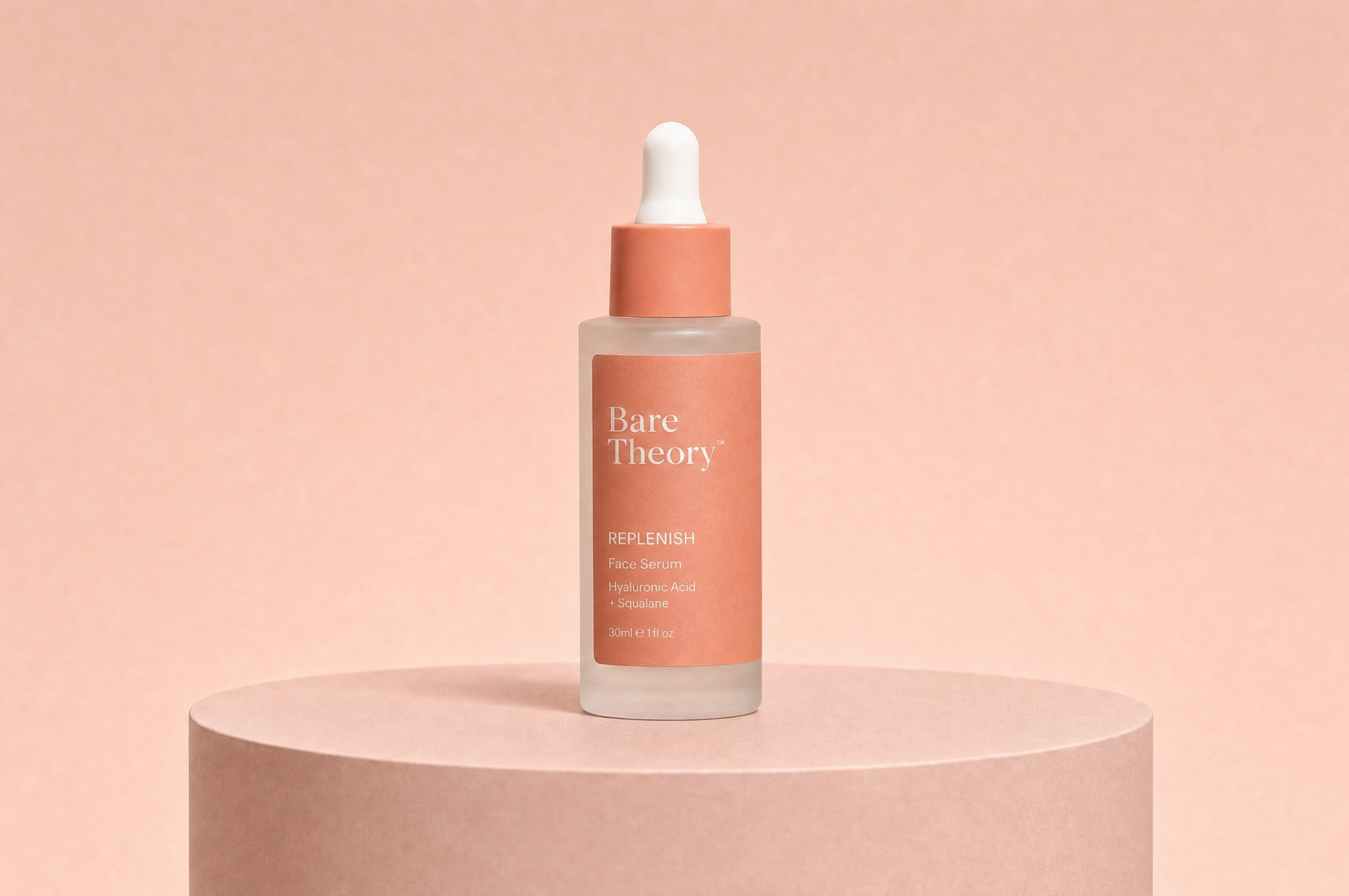 Bare Theory Replenish serum on a blush pedestal